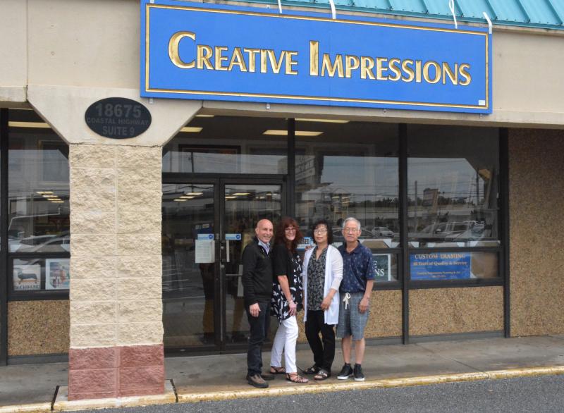 Creative Impressions closed its downtown Rehoboth location a month ago. The former owner retired, but the former employees have come together to reopen the shop in Midway Shopping Center on Route 1 in Rehoboth. Pictured are, l-r, Phil Gallelli, Susan Korwek, Roseann Jang and James Jang. CHRIS FLOOD PHOTOS